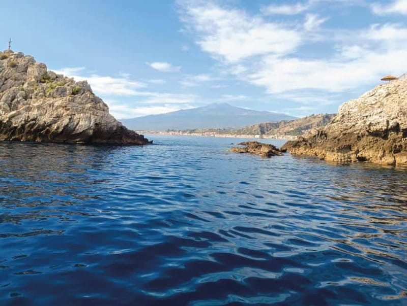 Taormina and Giardini Naxos: 2 Hour Dolphin Tour & Grotto - Isola Bella from the water