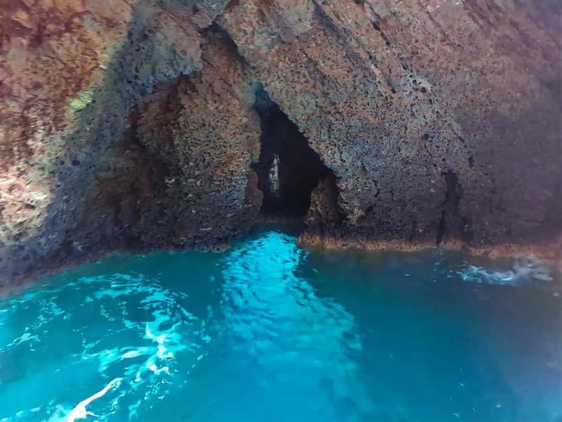 Taormina: Dolphin Tour and Sunset Aperitif Boat Tour - Isola Bella from the Ionian Sea