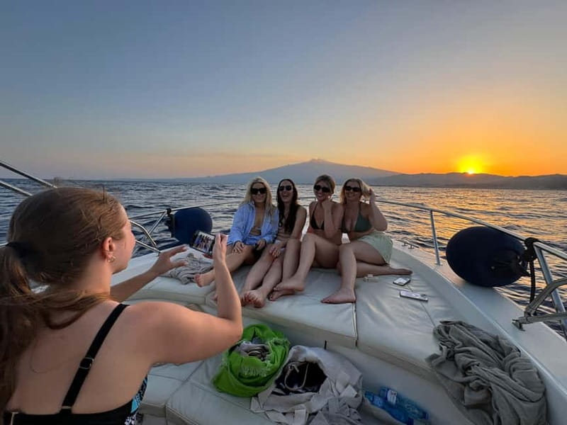 Taormina: Sunset Boat Tour with Dolphin Watching & Aperitif - The caves between Giardini Naxos and Taormina