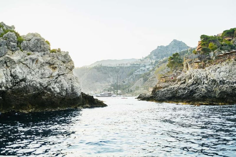 Taormina: Sunset Boat Tour with Dolphin Watching & Aperitif - What the $118.95 price includes