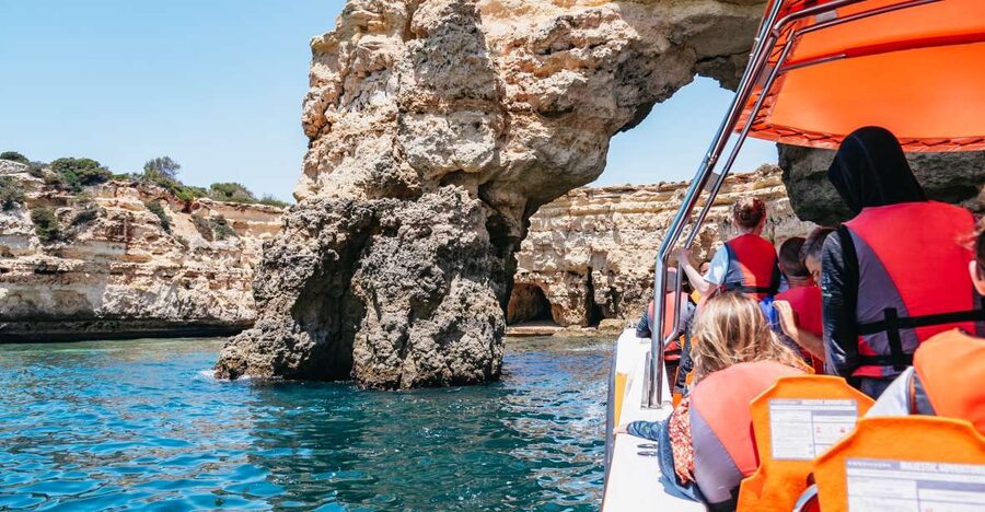Vilamoura: Benagil Cave Boat Tour with Entry&Dolphin search - Leaving Vilamoura Marina on a custom boat