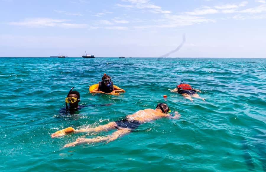 Wasini Island: Dolphin Spotting & Snorkel at Kisite Mpunguti - Sailing toward Kisite on a traditional dhow