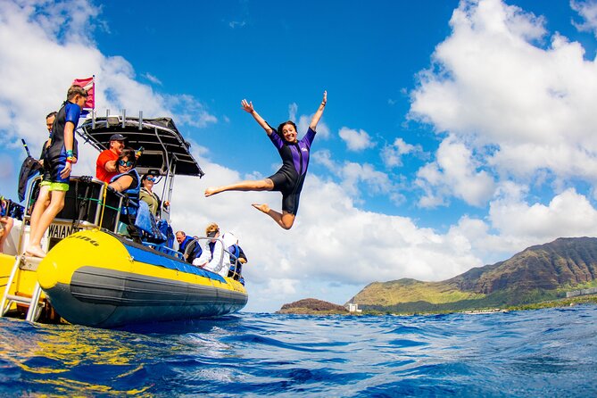 Wild Dolphin Watching and Snorkel Safari Off West Coast of Oahu - Searching for spinner dolphins along the coast