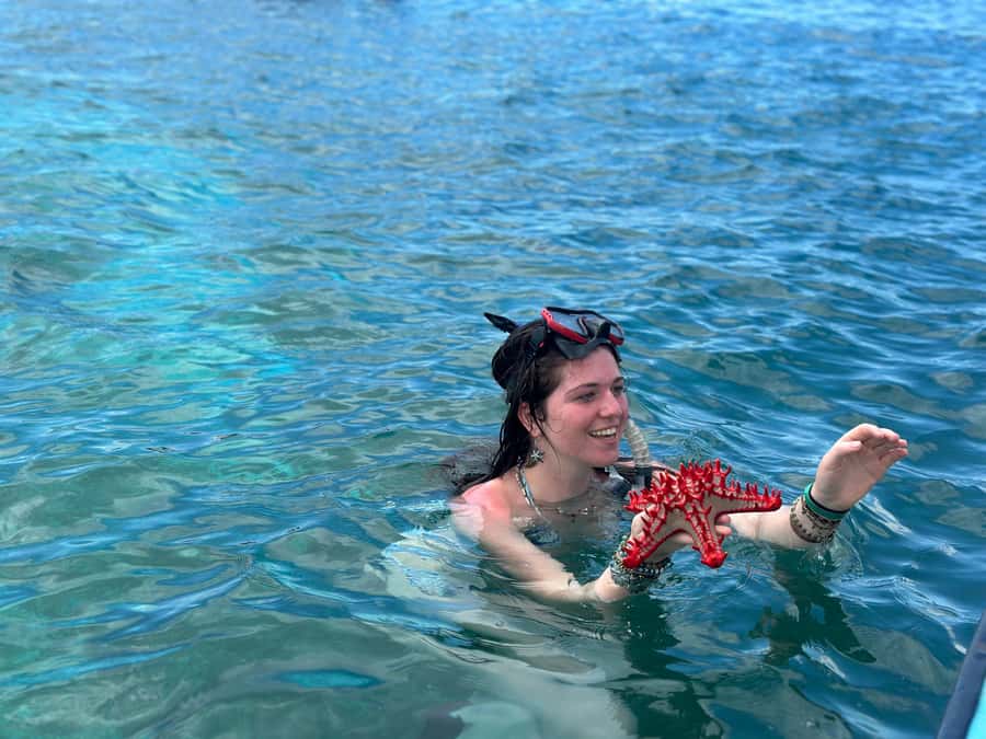 Zanzibar: Mnemba Island Dolphin and Snorkeling Tour - Sandbanks, shallow water, and fresh fruit